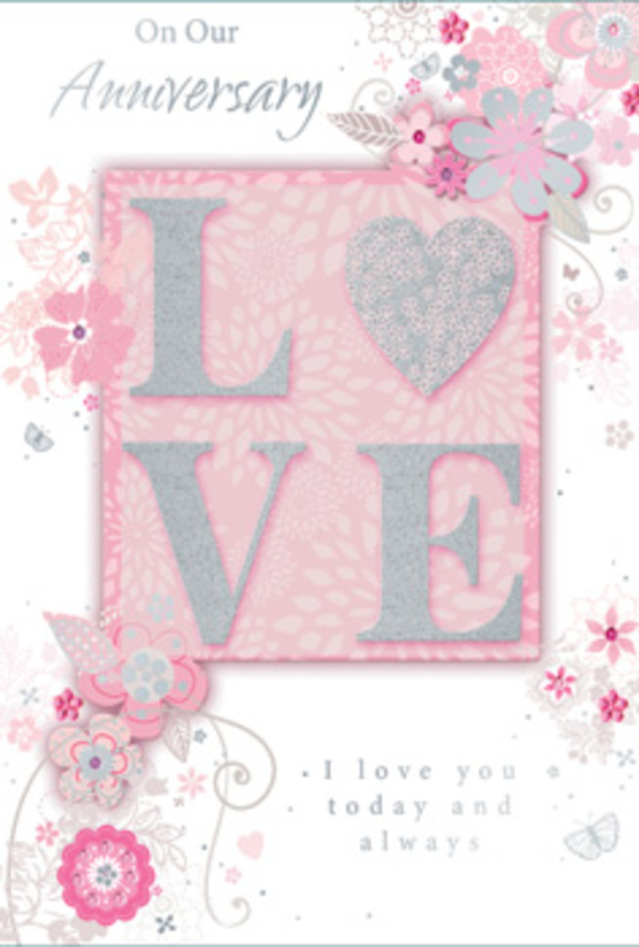 Romantic anniversary card in blush pink with pearly white florals and glitter detail, reminiscent of a spring stroll through Ealing Common. The card is shown from above, its surface bathed in soft, even light that brings out every subtle texture. At the centre, the word LOVE stands proudly in tall, raised letters, each stroke edged with ultra-fine glitter that looks like scattered starlight. The finish appears slightly rough to the touch, inviting fingers to linger and explore, much like the tactile pleasure of fresh petals and satin ribbons in a florist's studio. Surrounding this central word is a graceful drift of stylised flowers and leaves, drawn in delicate lines and shaded in pale blush, pearl white, and gentle grey with hints of silver foil. The blossoms are not heavily realistic; instead they resemble quick, confident sketches, the kind a florist might draft while planning an anniversary bouquet for delivery near Ealing Broadway or around Montpelier. Swirling tendrils and curving stems weave between the flowers, giving the card a sense of movement and airiness, as if a light spring breeze were passing over an arrangement. The background is a soft pink, almost like pressed rose petals, creating a warm, affectionate glow. An understated anniversary message, written in flowing script, nestles near the floral swirls, reinforcing the quiet sincerity of the design. Altogether, the card feels like a paper echo of a blush-toned bouquet: gentle, refined, and full of enduring love.